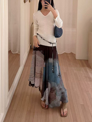 A thin hooded knitted top for women