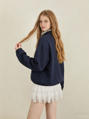 Color-blocked plaid stand-up collar half-open sweatshirt