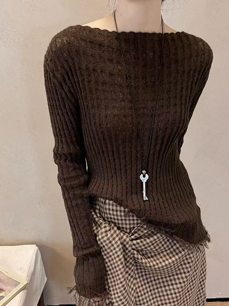 A special textured knitted fringed top for women A special textured knitted fringed top for women