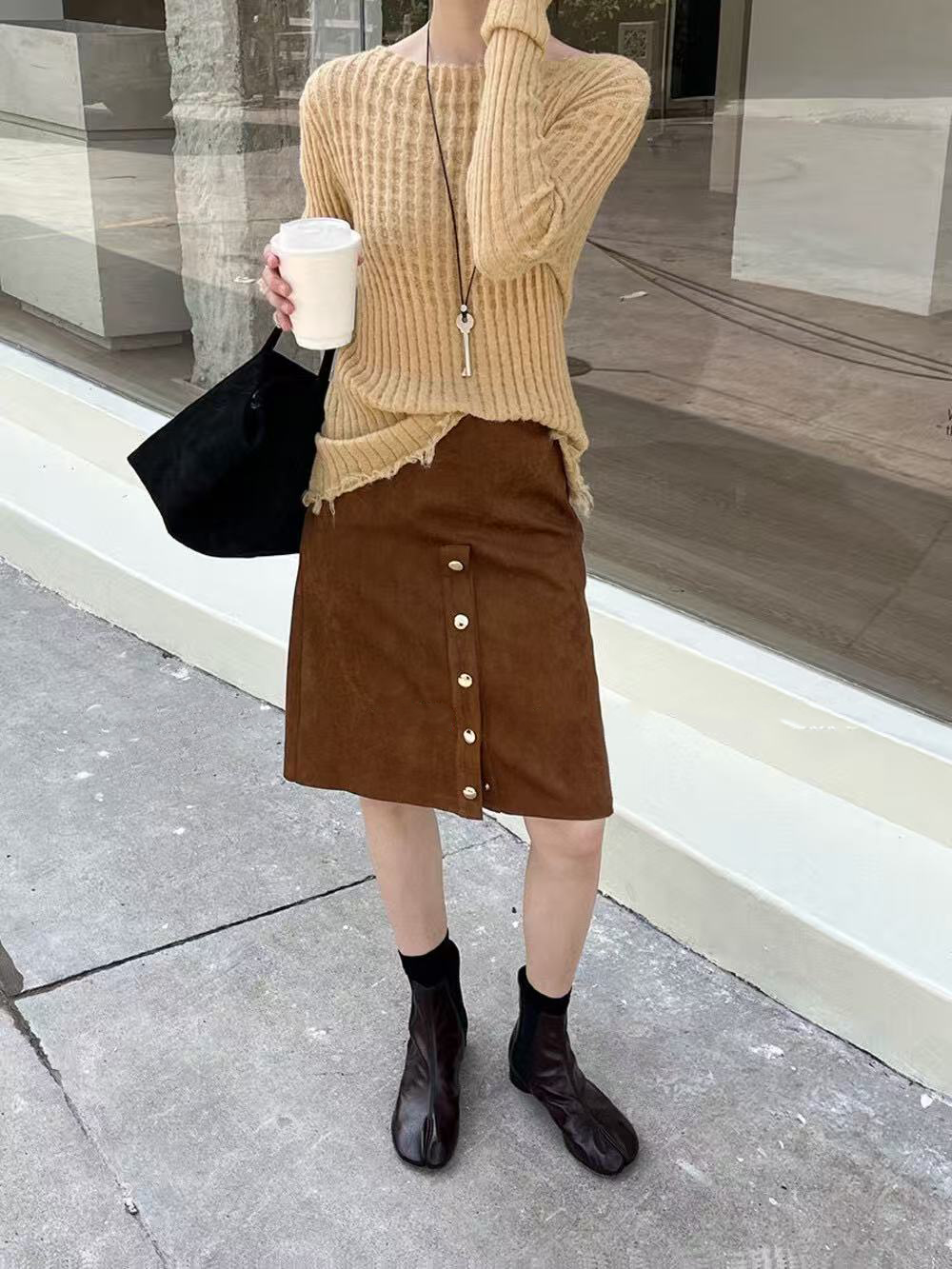 A special textured knitted fringed top for women A special textured knitted fringed top for women