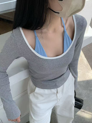 A two-piece fake top with color-blocking splicing