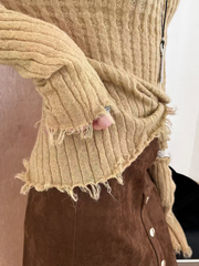 A special textured knitted fringed top for women