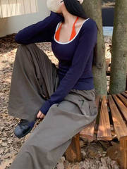 A two-piece fake top with color-blocking splicing