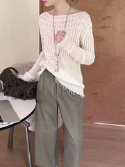 A special textured knitted fringed top for women