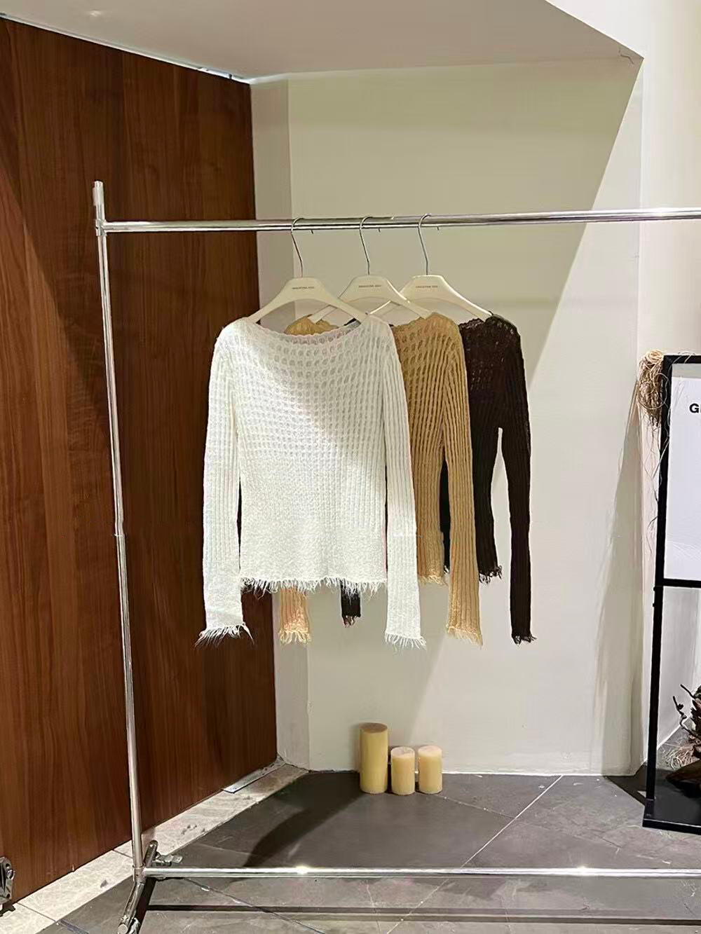 A special textured knitted fringed top for women A special textured knitted fringed top for women