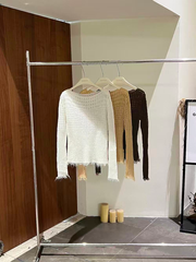 A special textured knitted fringed top for women