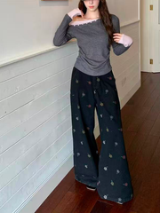 A sexy knitted top with contrasting color buttons for women