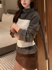 A long-sleeved top with checkered and color-blocking patterns for women