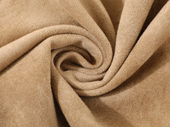 A casual coat with spliced cuffs and straps for women