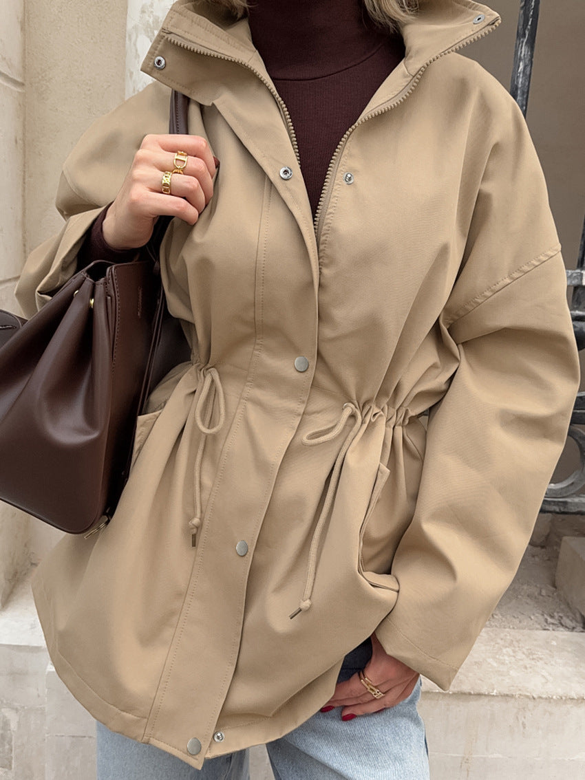 A mid-length coat with a stand-up collar and drawstring at the waist for women A mid-length coat with a stand-up collar and drawstring at the waist for women