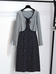 A two-piece set of floral halter dress and cardigan
