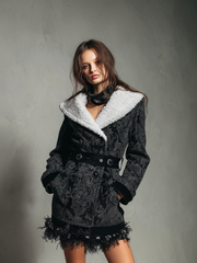 A lady's fur tassel hem floral printed coat