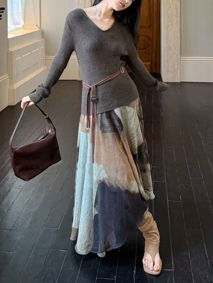 A thin hooded knitted top for women