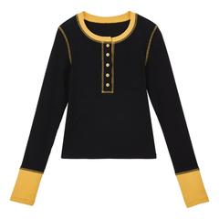A long-sleeved knitted top in contrasting colors for women