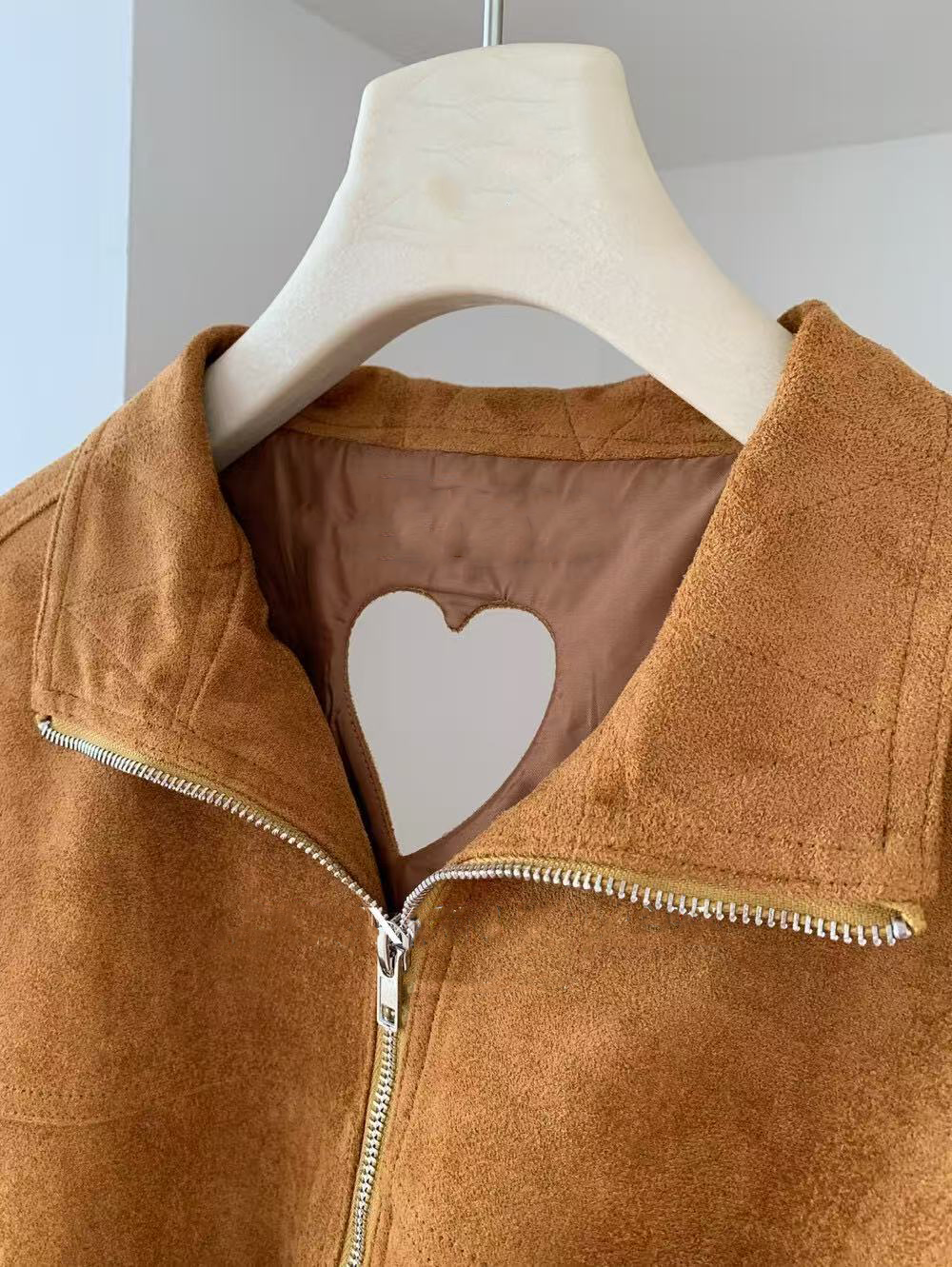 Heart-shaped hollow drawstring coat