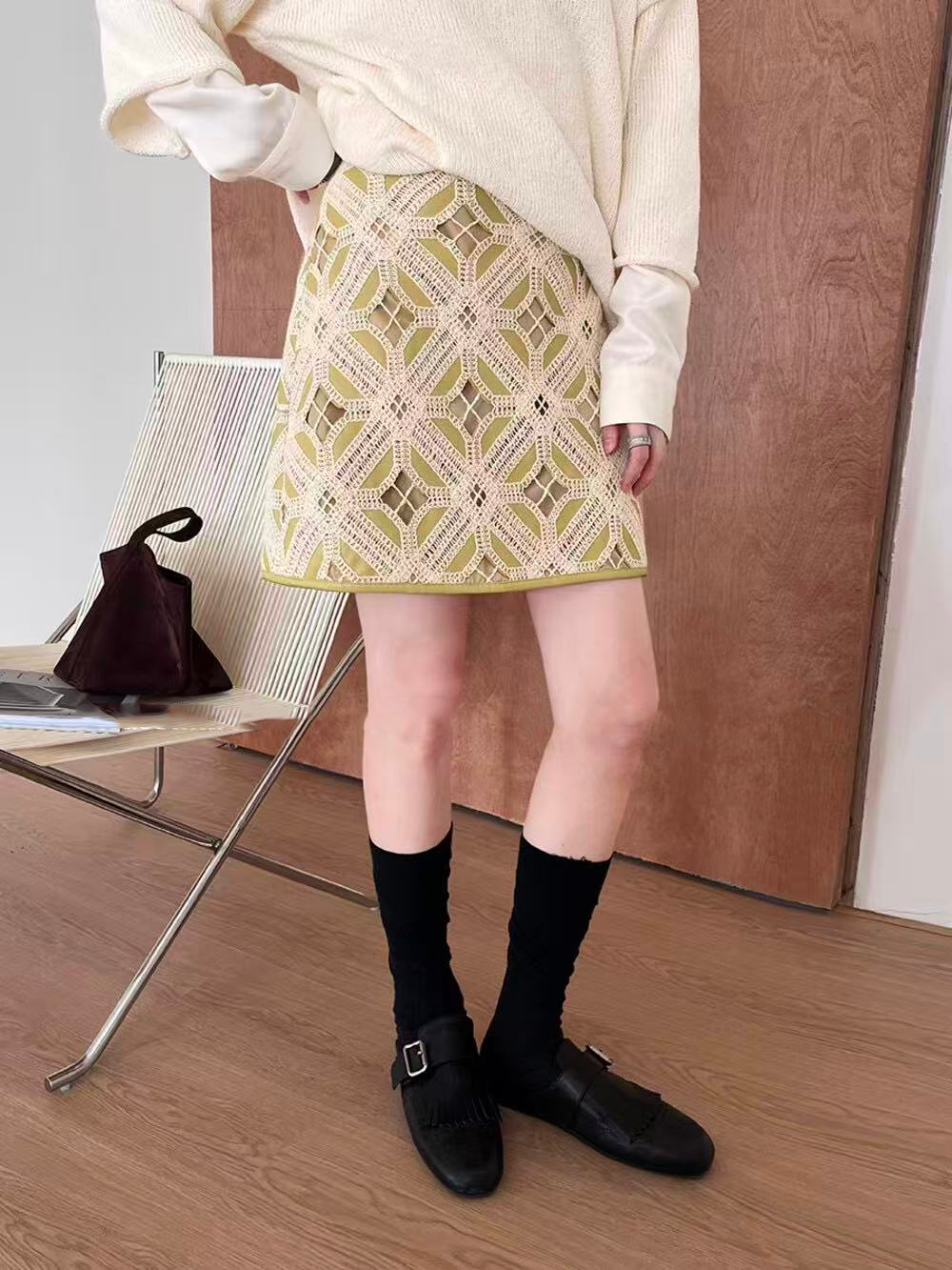 A short skirt with leather lace for women