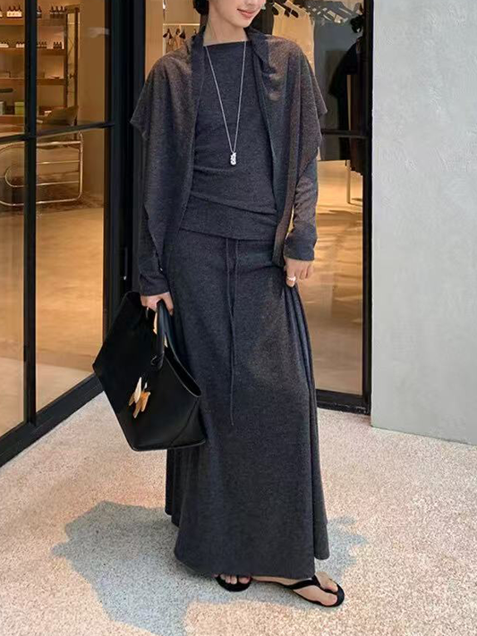 A three-piece set of knitted top, skirt and shawl