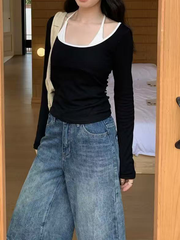 A two-piece fake top with color-blocking splicing