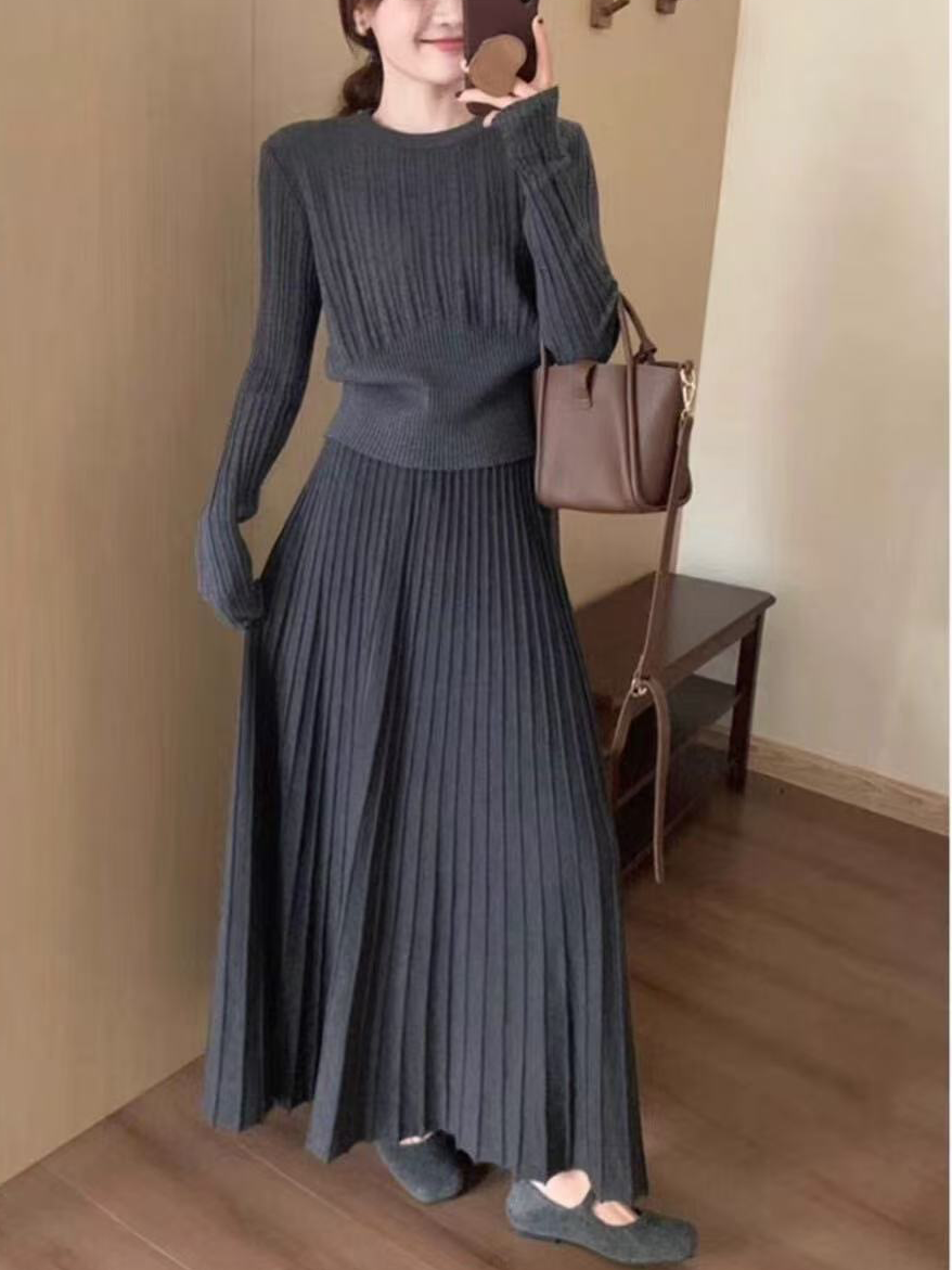 A women's knitted top skirt set